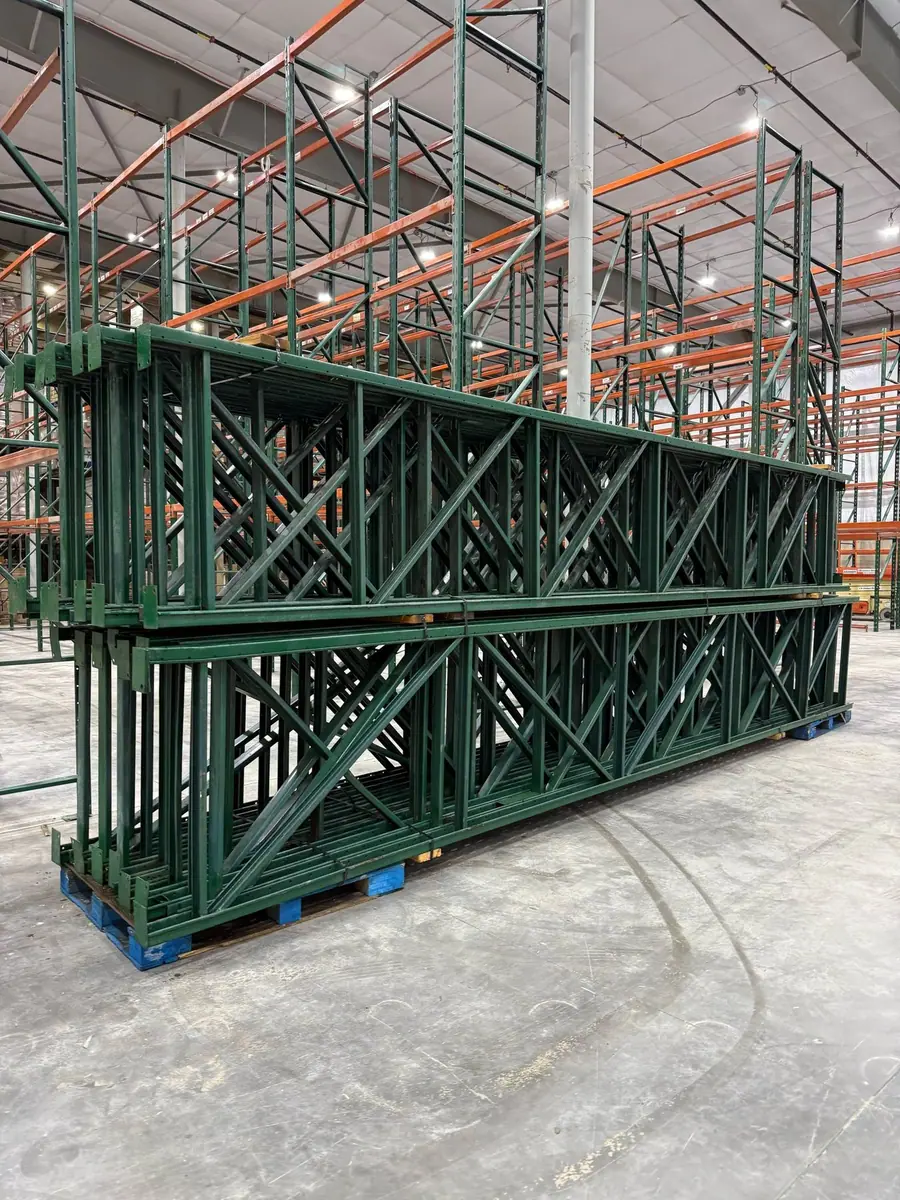 Assembled green and orange pallet racking in warehouse