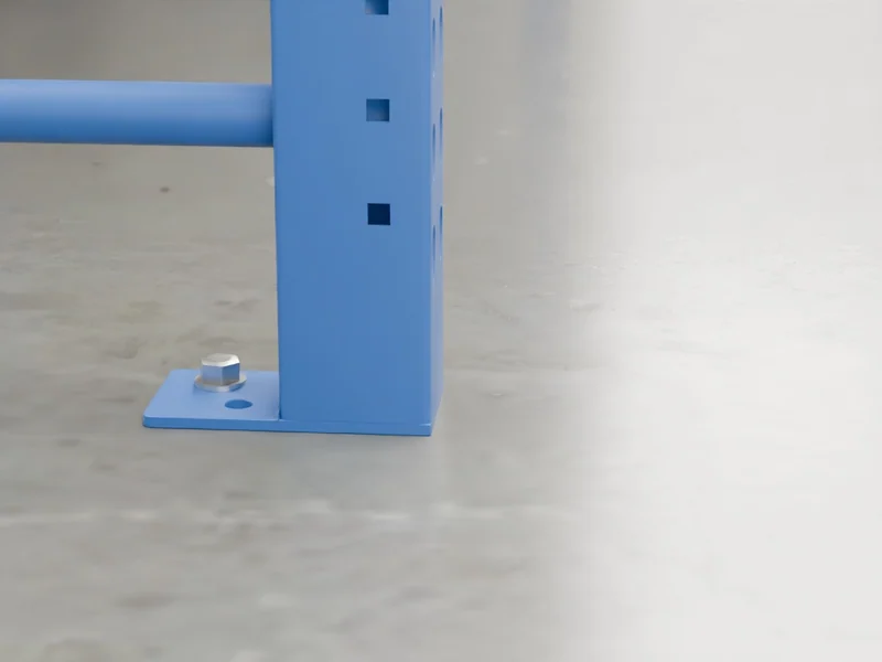 Selective Racking: Anchors. Wedge anchors into the slab; shims keep columns plumb.