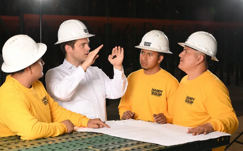 Handy Equip team going over a layout